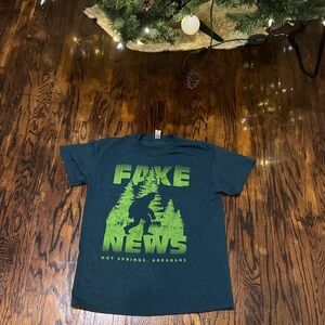 Fake news SASQUASH Green Graphic T-Shirt Hot Springs Arkansas